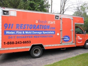 Water Damage Millstone Restoration Box Truck Parked At Residential Job Location