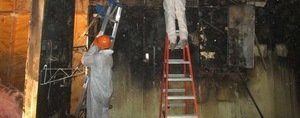 Mold Damage Restoration Technicians Inspecting Water Leaks